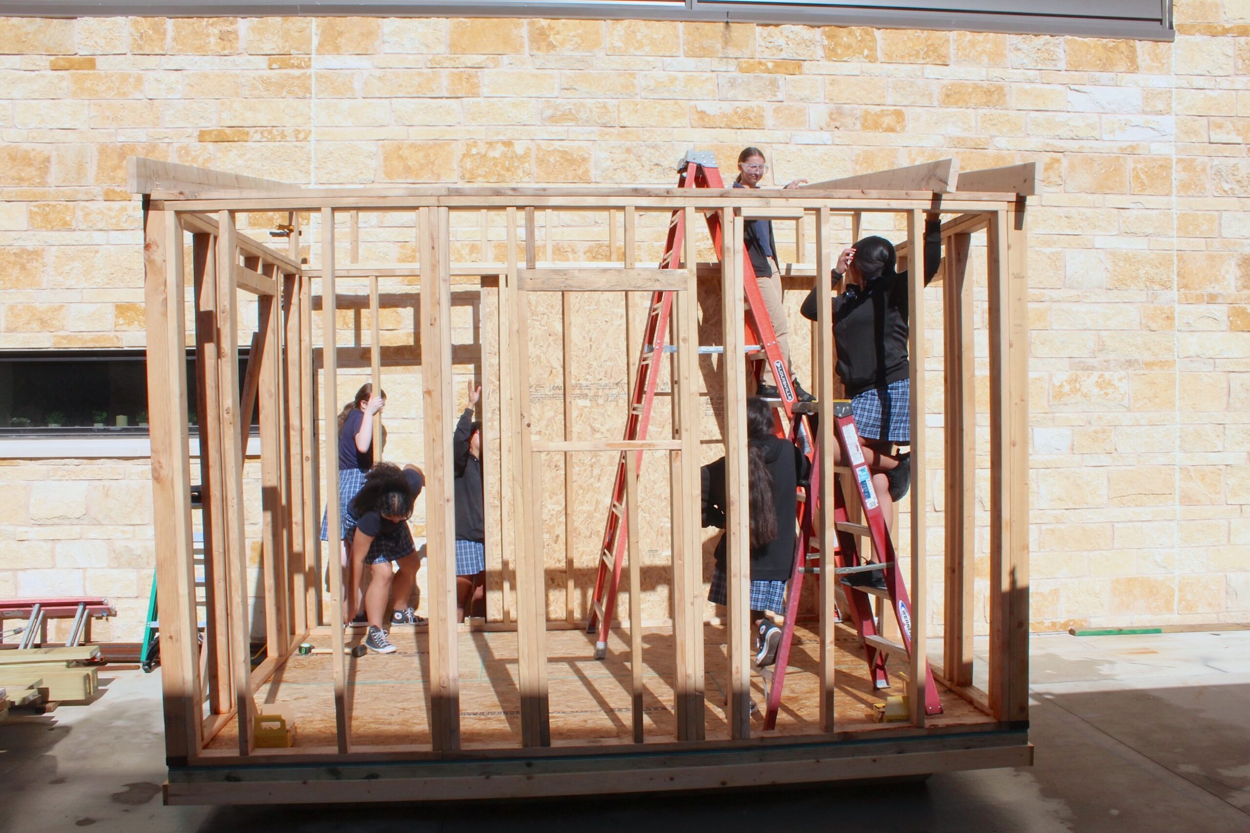Students testing an engineering construction
